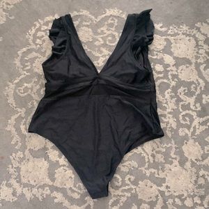 Black low cut bathing suit. Size 22-24